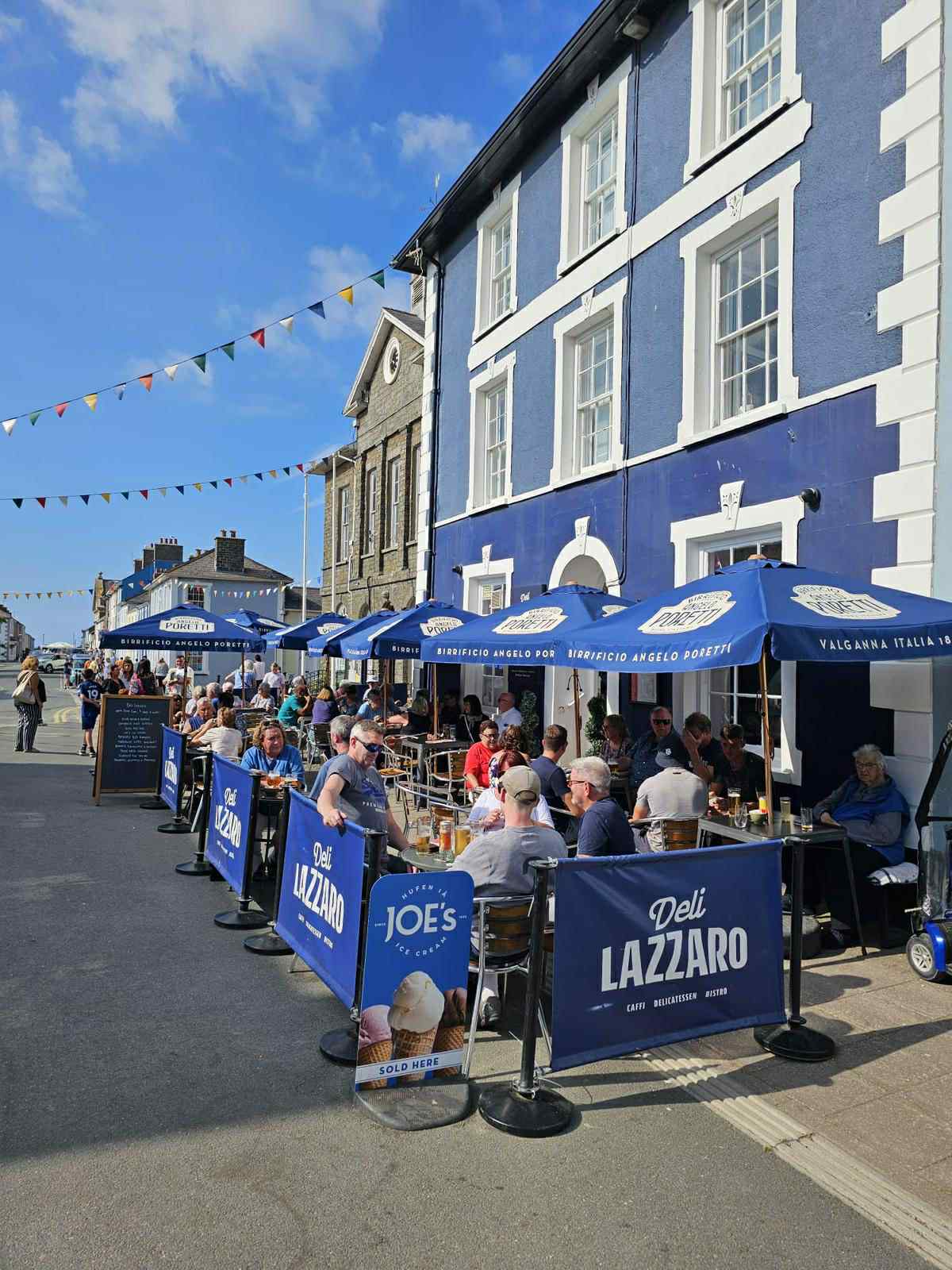 Deli lazzario busy outdoor cafe scene